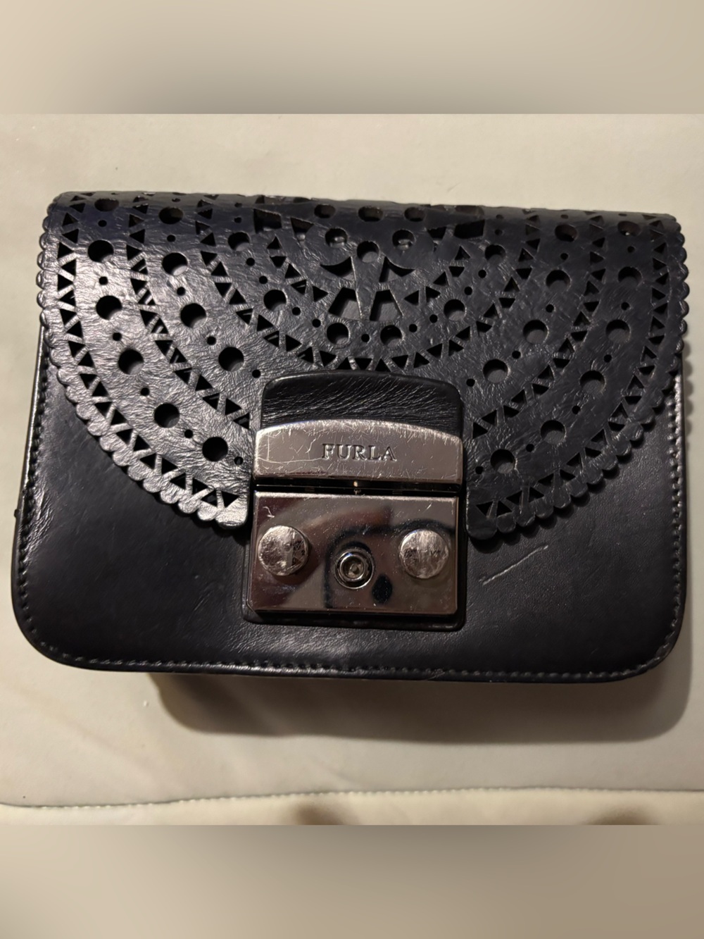 Furla Black Laser-Cut Leather Clutch with Silver Hardware